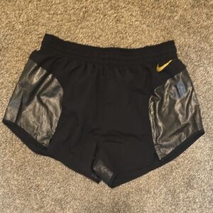 Nike Women's Black and Gold Athletic Shorts